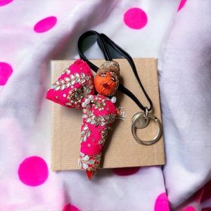 Christian Louboutin doll bag charm keychain pink orange